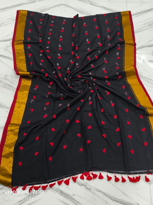 Black saree with red patterns and yellow border on a white background