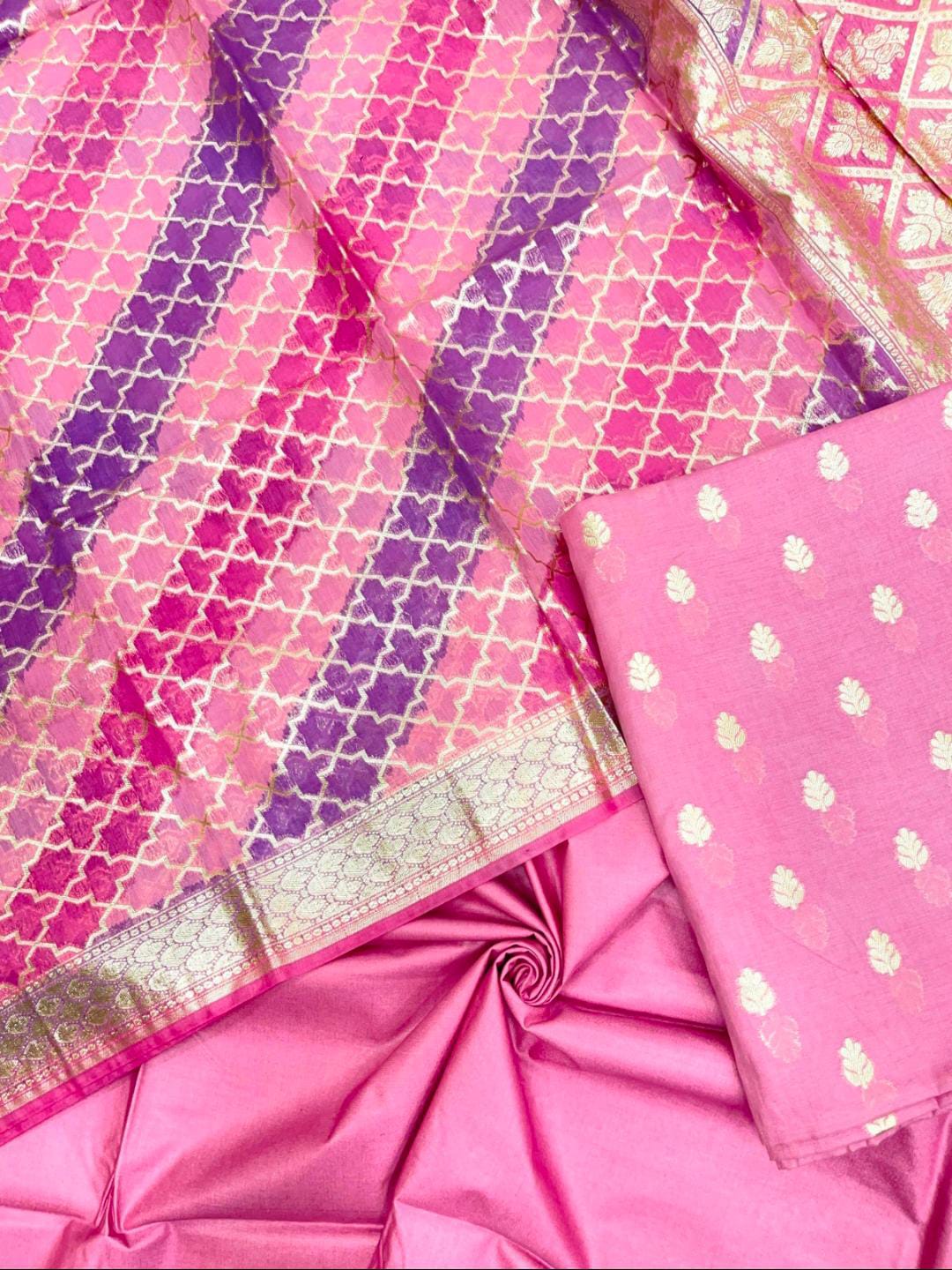 Pink and purple patterned fabric with a gold border