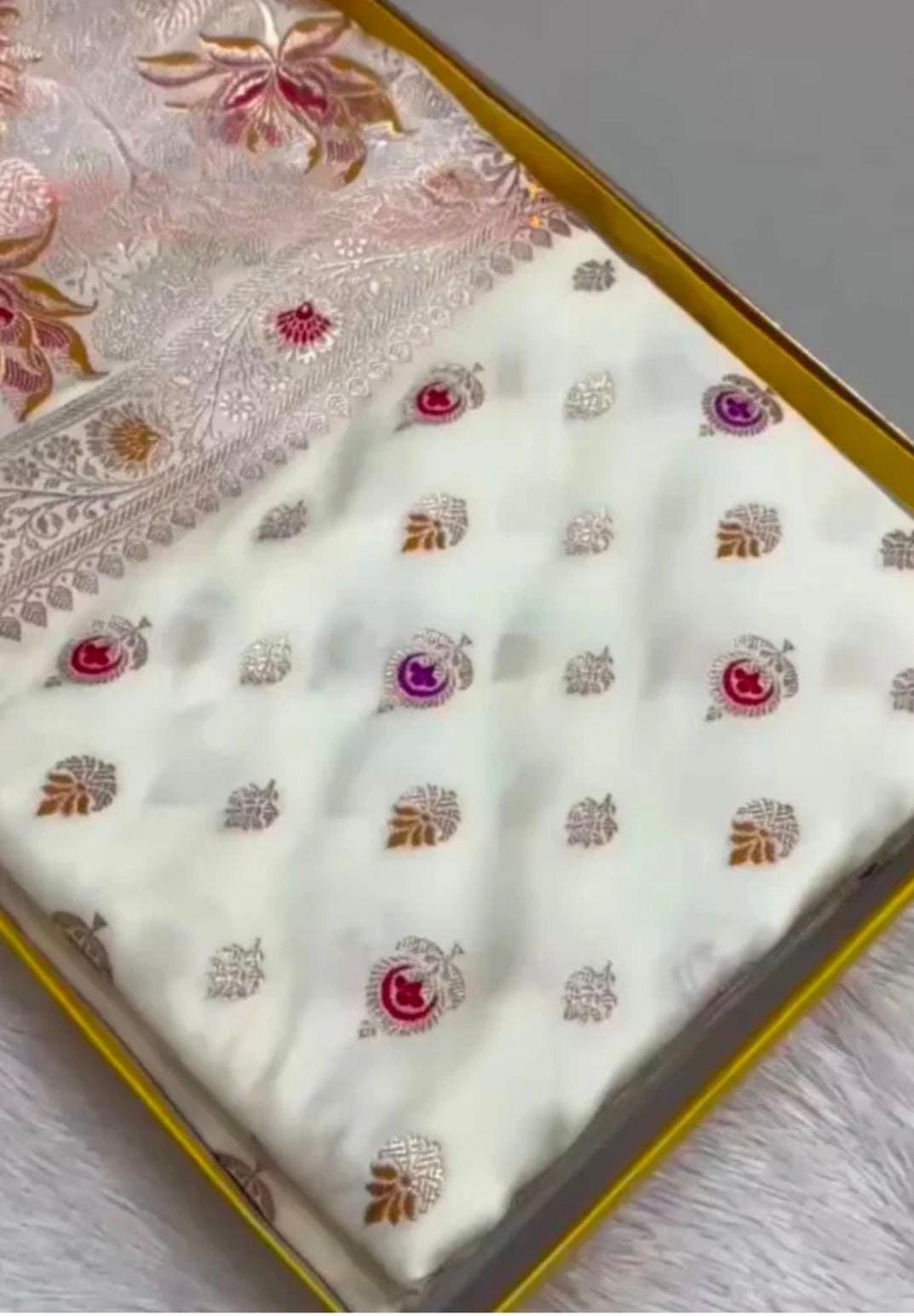 White fabric with floral patterns in a decorative box