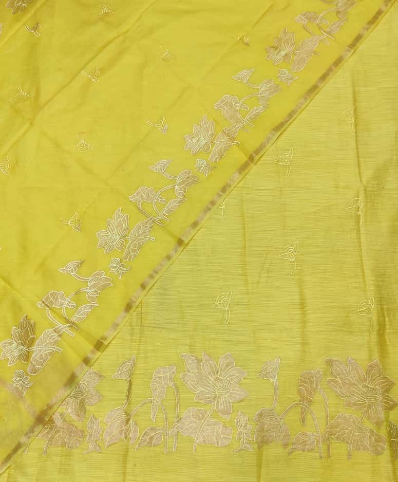 Yellow fabric with floral embroidery