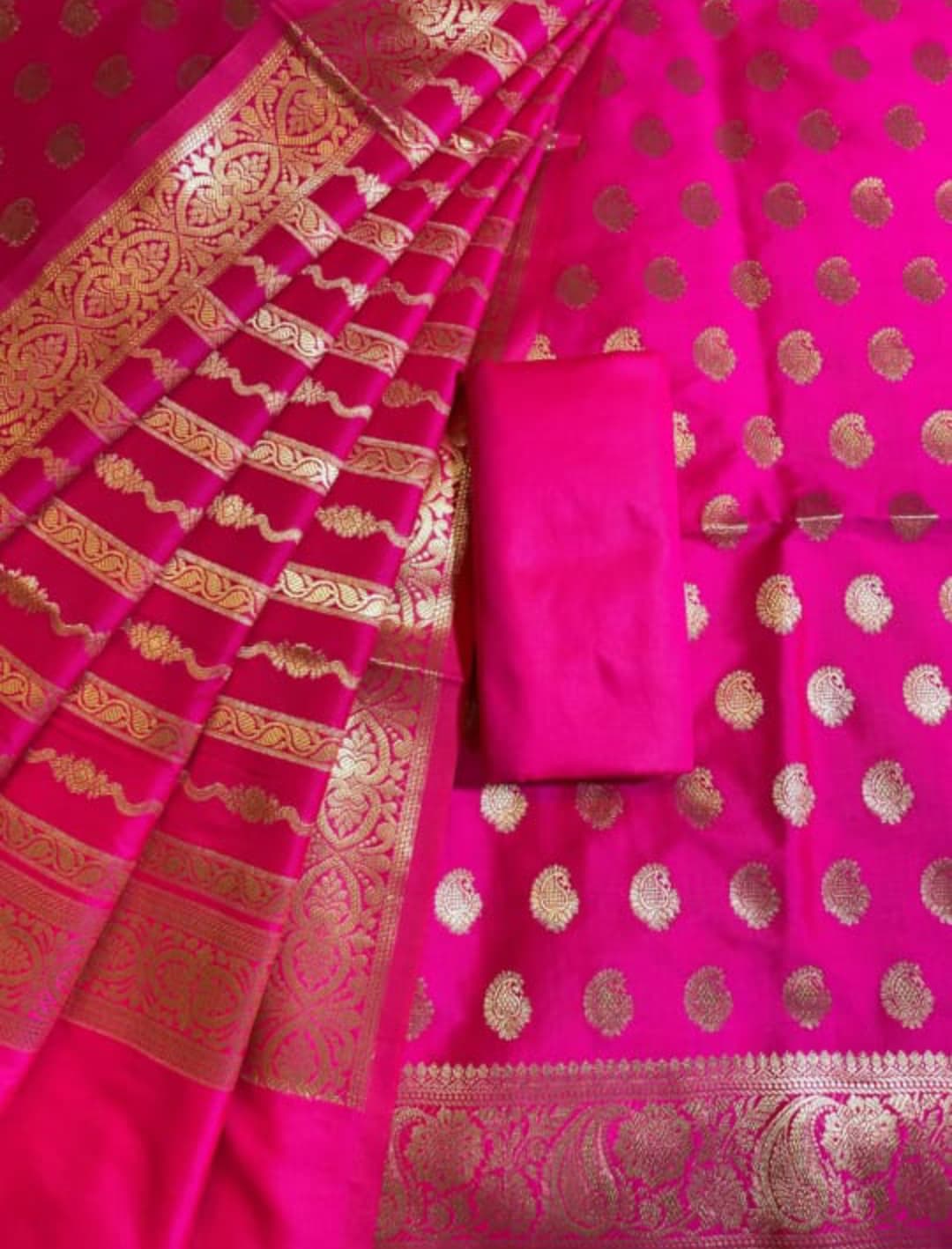 Pink saree with gold patterns