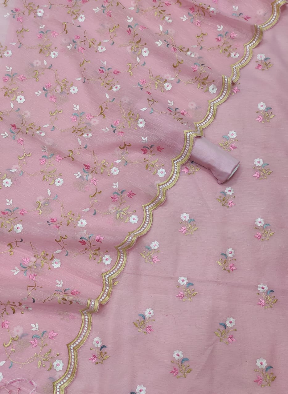 Pink fabric with floral embroidery and gold border