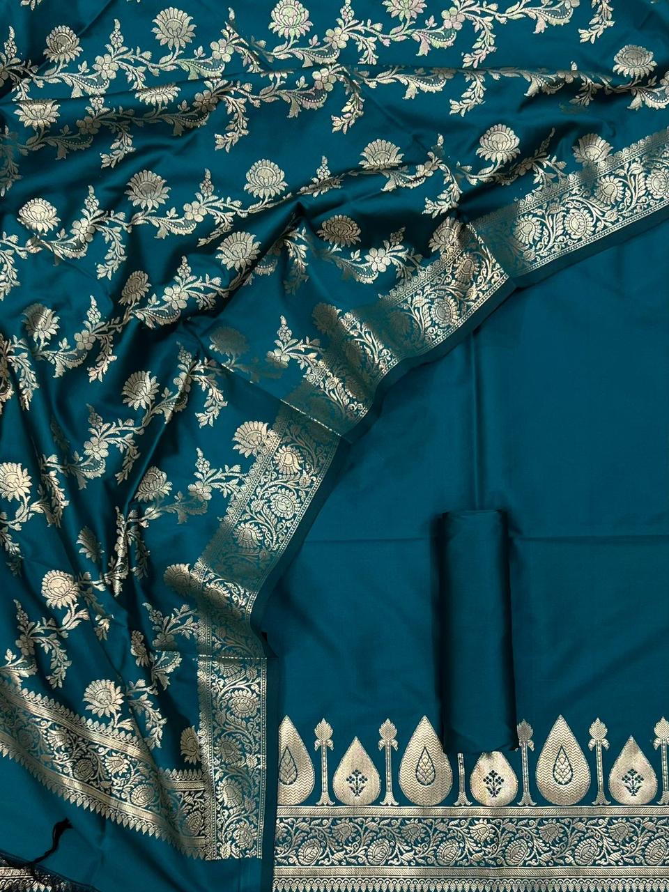 Blue fabric with intricate white patterns