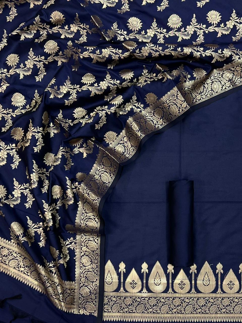 Navy blue fabric with intricate white floral and geometric patterns