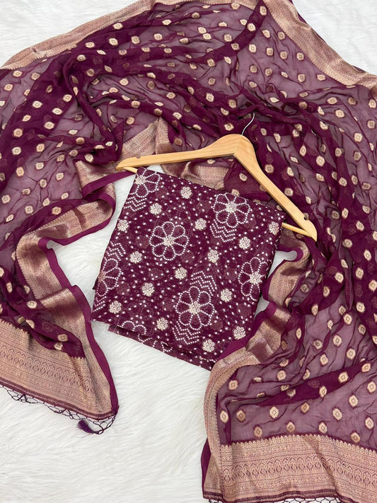 Maroon and beige traditional outfit with a hanger on a white background