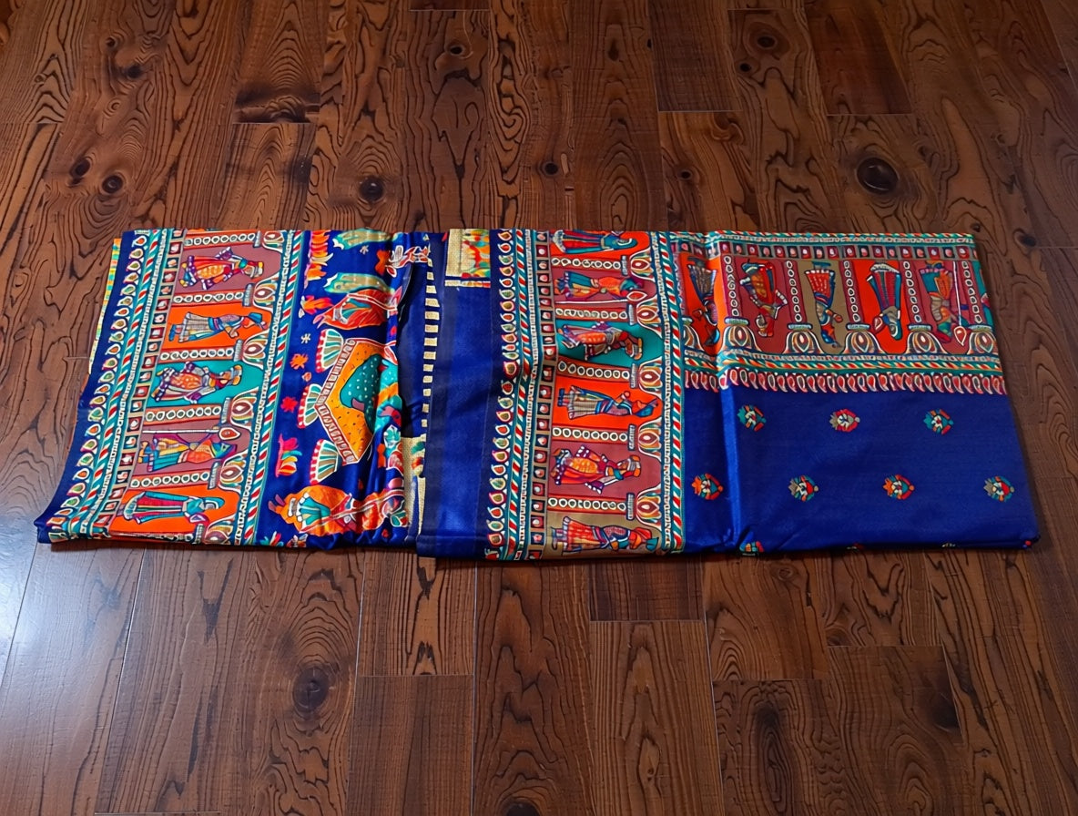 Colorful fabric with intricate patterns on a wooden floor